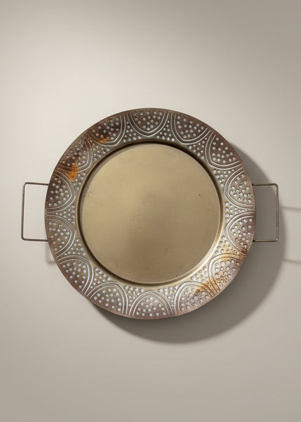 Large gold charger plates with square double handles.