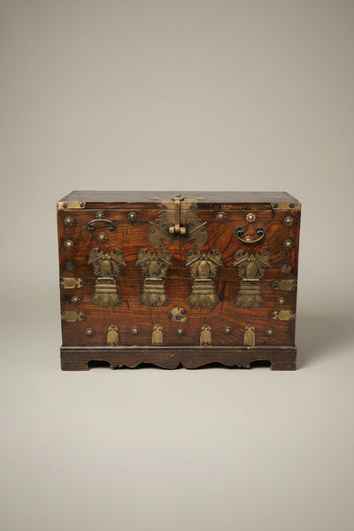 Korean Bandaji chest.  19th century, made from elm with decorative brass mounts and lined with original rice paper.  Bandaji is the term for these front-opening hinged chests. It could also be an Oriental campaign tea chest.