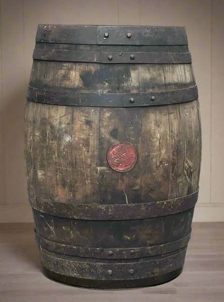 Copper banded barrel with well worn patina and inset circular motif panel of grapes.