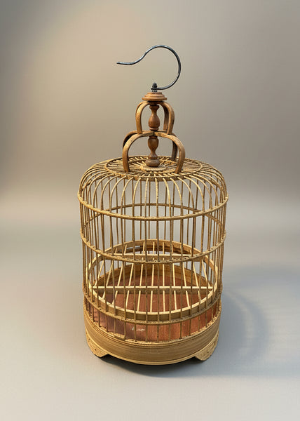 Set of traditional gold bamboo bird cages - large, medium, and small options available.