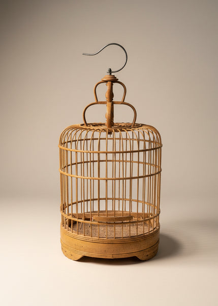 Set of traditional gold bamboo bird cages - large, medium, and small options available.