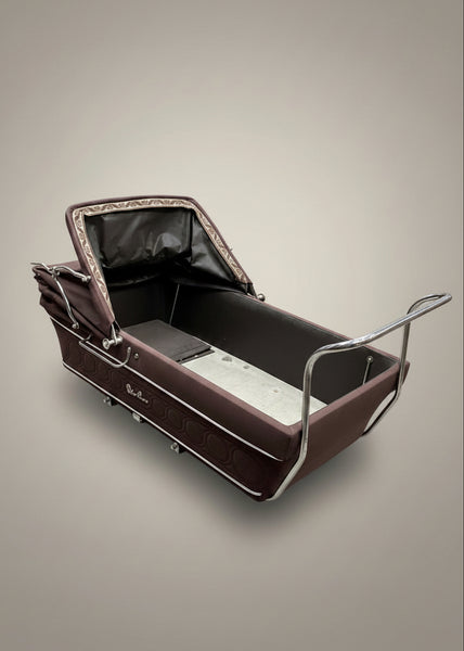 Vintage silver cross coachbuilt pram, circa 1960s.