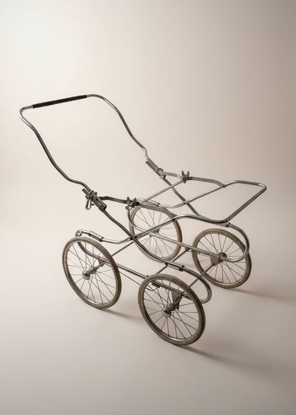 Vintage silver cross coachbuilt pram, circa 1960s.