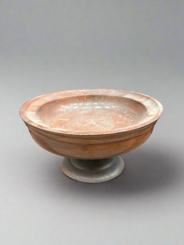 A large, lidded, vintage, wooden bowl in an aged condition.