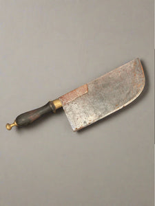 Large antique butcher's cleaver in an aged condition.