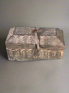 Small Aztec-style carved wooden trinket box.