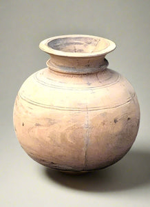 Small spherical wooden vase or water carrier.