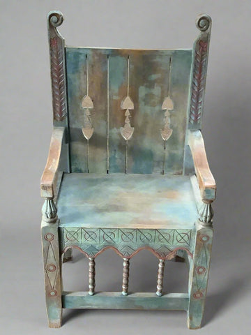 Unusual Scandinavian style hand-carved chair with teal patina.