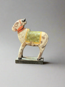 Hand-carved and hand-painted wooden deer decorative statuette.