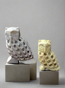 Indian carved undercut owl statuettes made from polished gaurara stone.