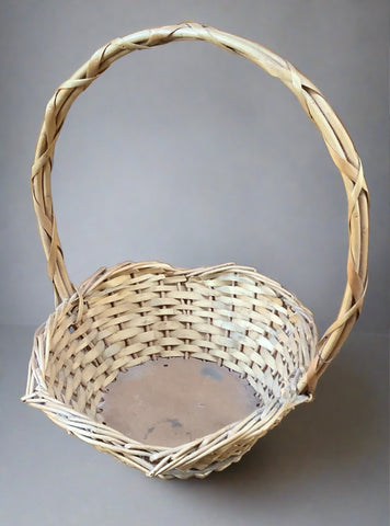 Heart-shaped wicker bouquet basket.