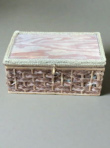 Wicker and wood sewing or storage box with green fabric lining.