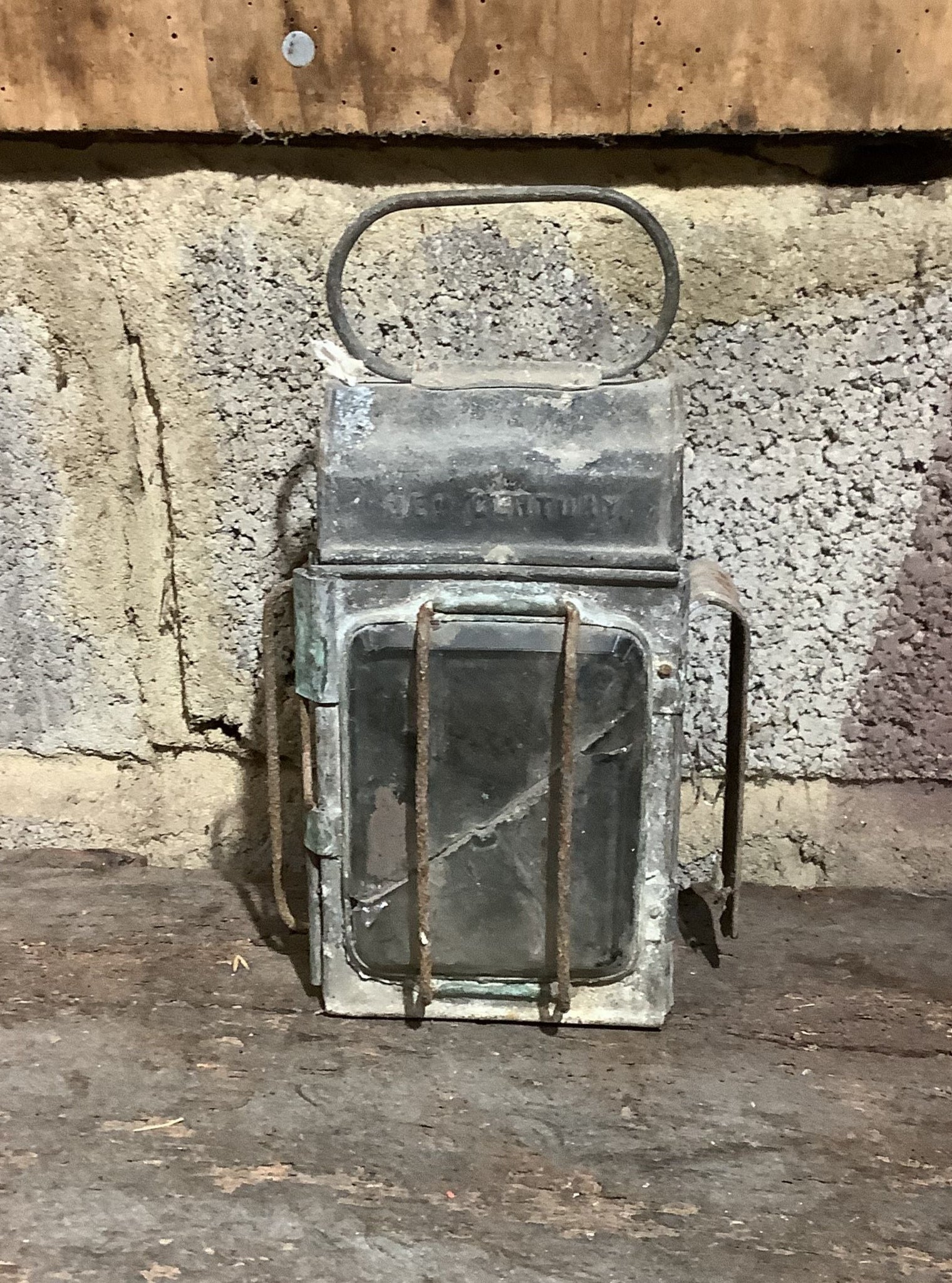 19th-century square carriage lantern, likely late 1800s. It was made to hang onto the side of a carriage with two clear beveled windows facing the front and side Film TV Props London