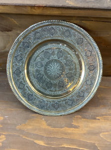 Antique Arabic style arabesque brass charger or decorative plate with thistle symbols.
