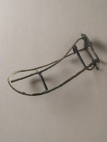 Single metal saddle rack to be mounted on the wall.