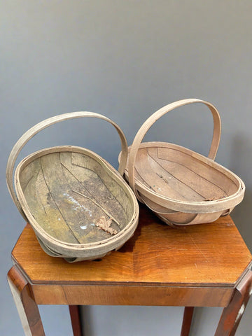 Oblong wooden trugs designed to carry produce.