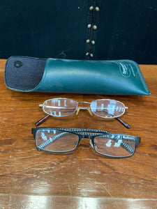 Two pairs of metal framed glasses with a protective case.