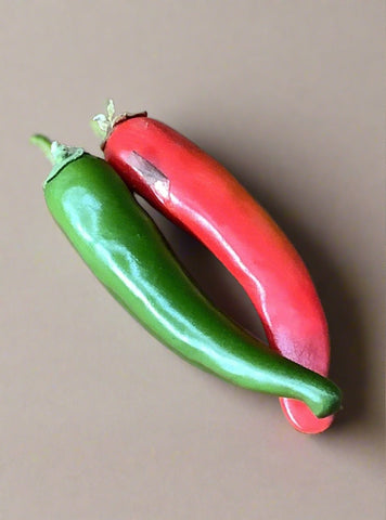 Faux green and red chili peppers. Great for market or kitchen dressing.