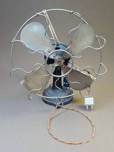 1930s-40s vintage metal desk fan with an American plug.