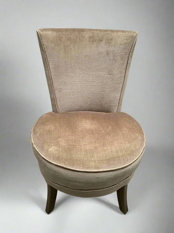 Vintage beige boudoir chair with a round seat and square top.