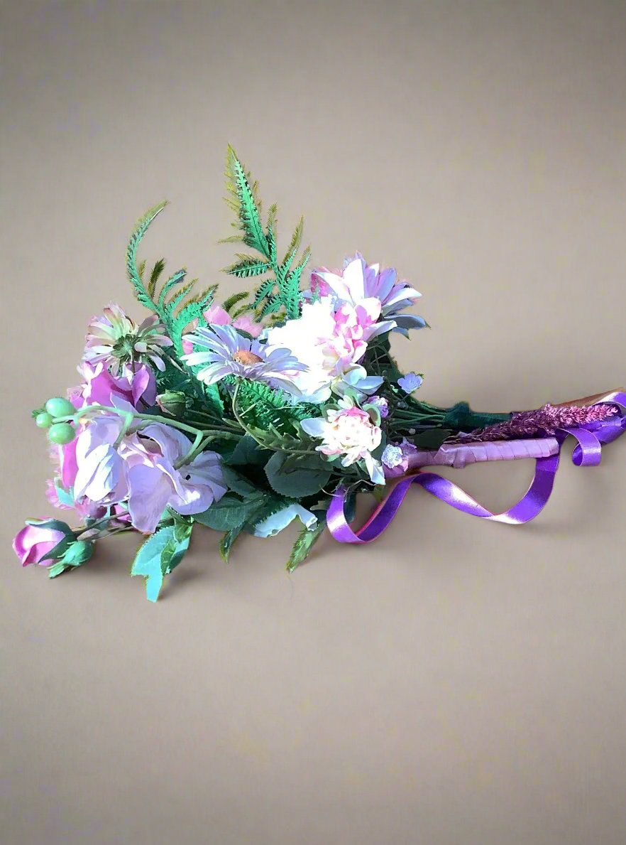 Bunch of pink and white plastic flowers (daisies/roses.)