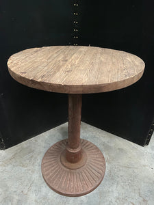 Round Table with a Heavy Metal Base