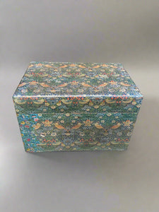 Medium-size simple storage box printed with the Strawberry Thief pattern by William Morris.