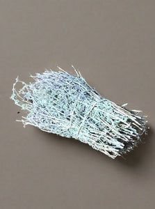 Bunches of dried lavender with trimmed stalks.