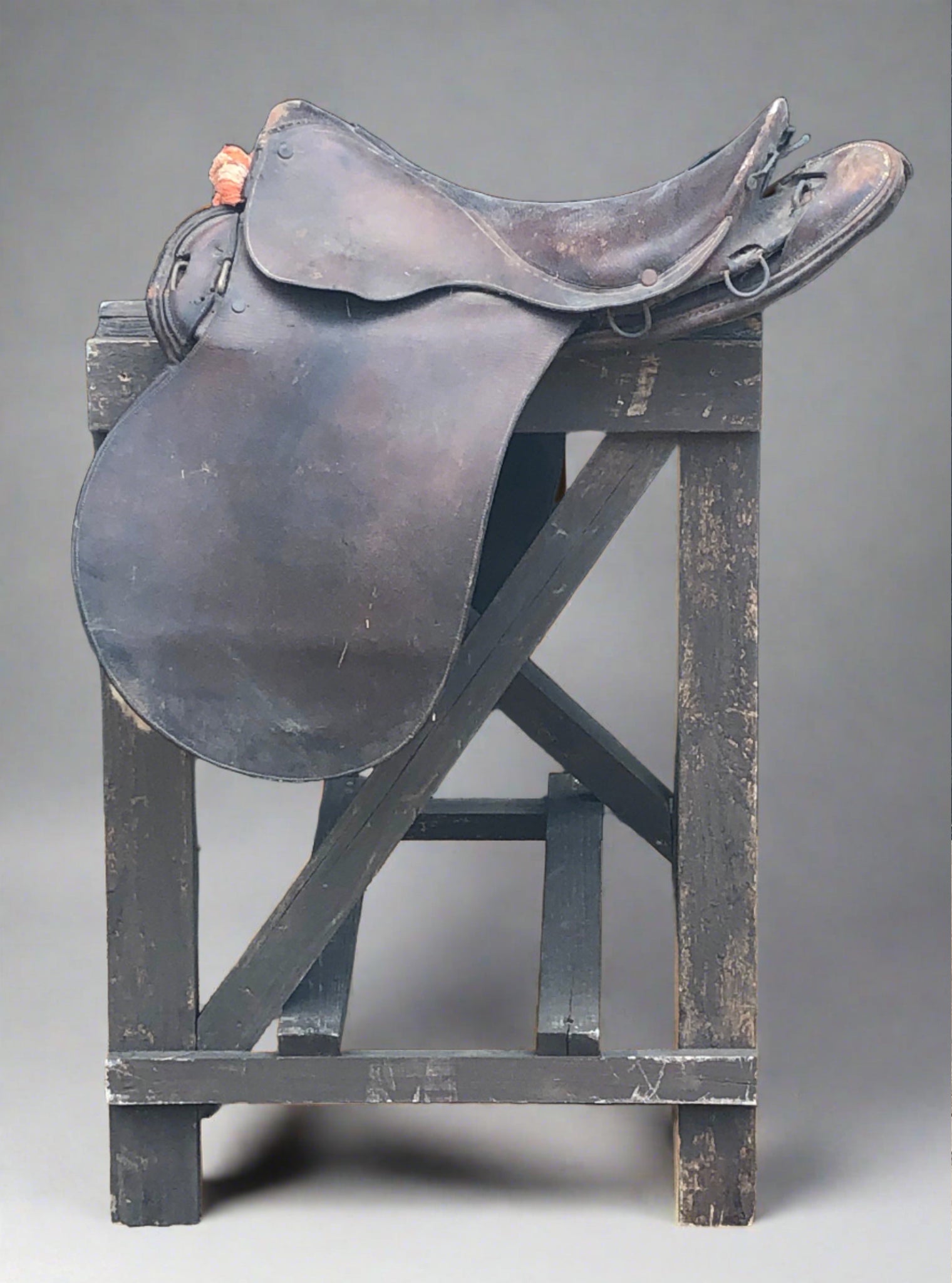 Well worn leather saddle.